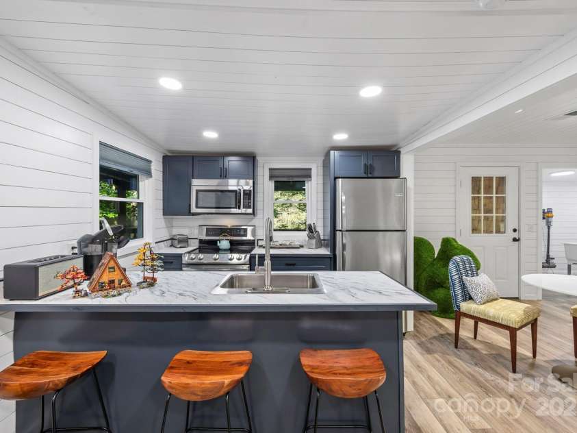 40 Squirrel Lane, Sapphire, NC 28774.  MLS# CAR4272442, YatesRealty ID 26666. Custom Island and Upgraded Kitchen