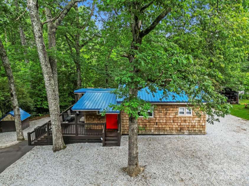 40 Squirrel Lane, Sapphire, NC 28774.  MLS# CAR4272442, YatesRealty ID 26666. Front Elevation via Drone