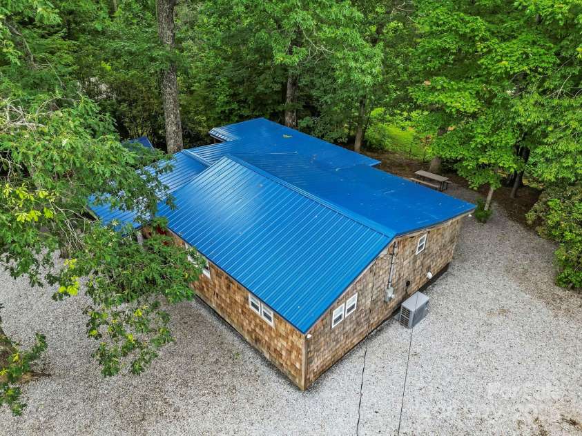40 Squirrel Lane, Sapphire, NC 28774.  MLS# CAR4272442, YatesRealty ID 26666. Nestled in the Mountains