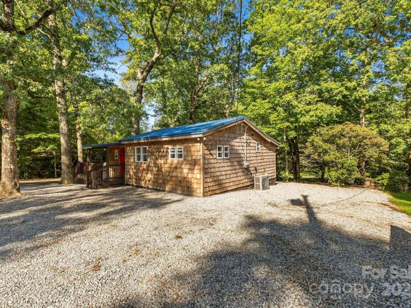40 Squirrel Lane, Sapphire, NC 28774.  MLS# CAR4272442, YatesRealty ID 26666. Plenty of Parking