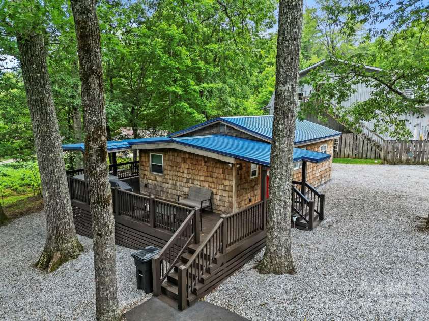 40 Squirrel Lane, Sapphire, NC 28774.  MLS# CAR4272442, YatesRealty ID 26666. Property Overview: Aerial