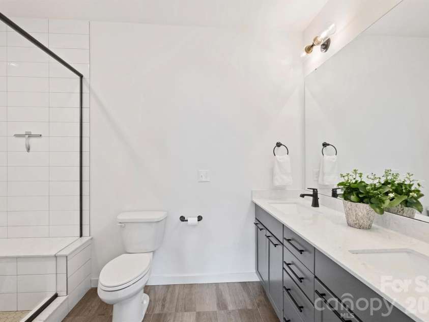 2829 Brevard Street, Charlotte, NC 28205.  MLS# CAR4364948, YatesRealty ID 26667. Bath for primary bedroom 2
