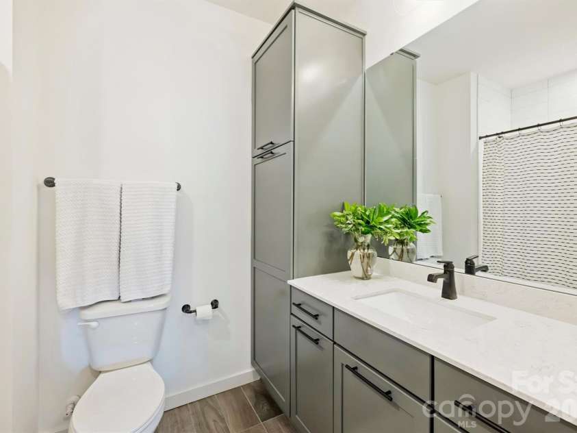 2829 Brevard Street, Charlotte, NC 28205.  MLS# CAR4364948, YatesRealty ID 26667. Lower level full bath