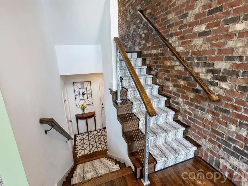 2829 Brevard Street, Charlotte, NC 28205.  MLS# CAR4364948, YatesRealty ID 26667. Stairs to lower level