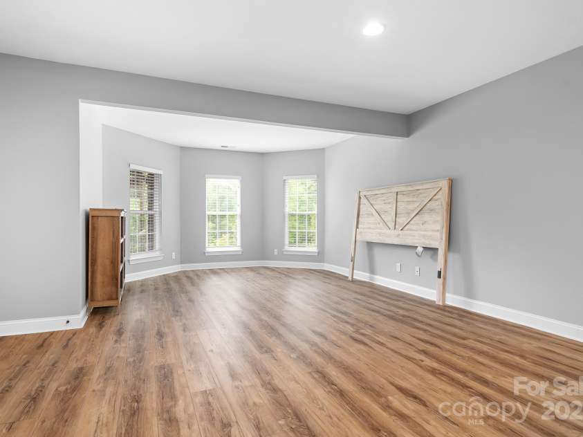 7191 Grist Mill Court, Denver, NC 28037.  MLS# CAR4221551, YatesRealty ID 26668. Basement with luxury vinyl planks throughout
