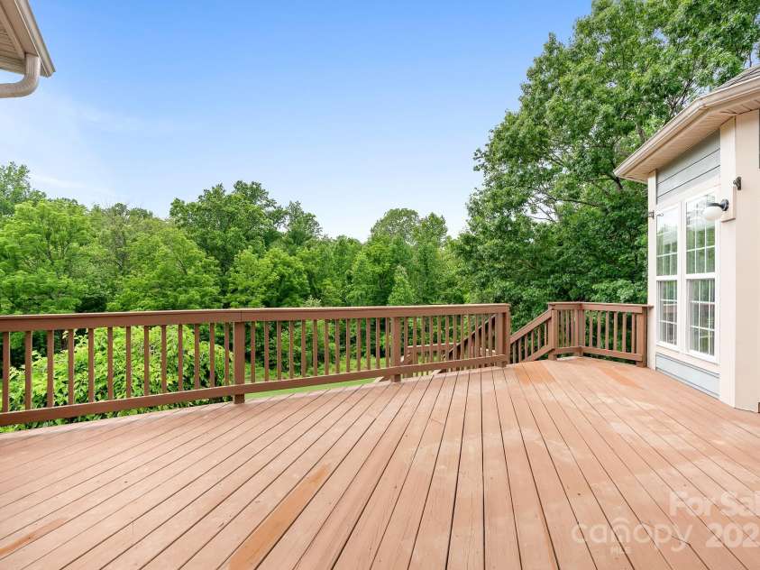 7191 Grist Mill Court, Denver, NC 28037.  MLS# CAR4221551, YatesRealty ID 26668. Deck with access to dining room and primary bedroom