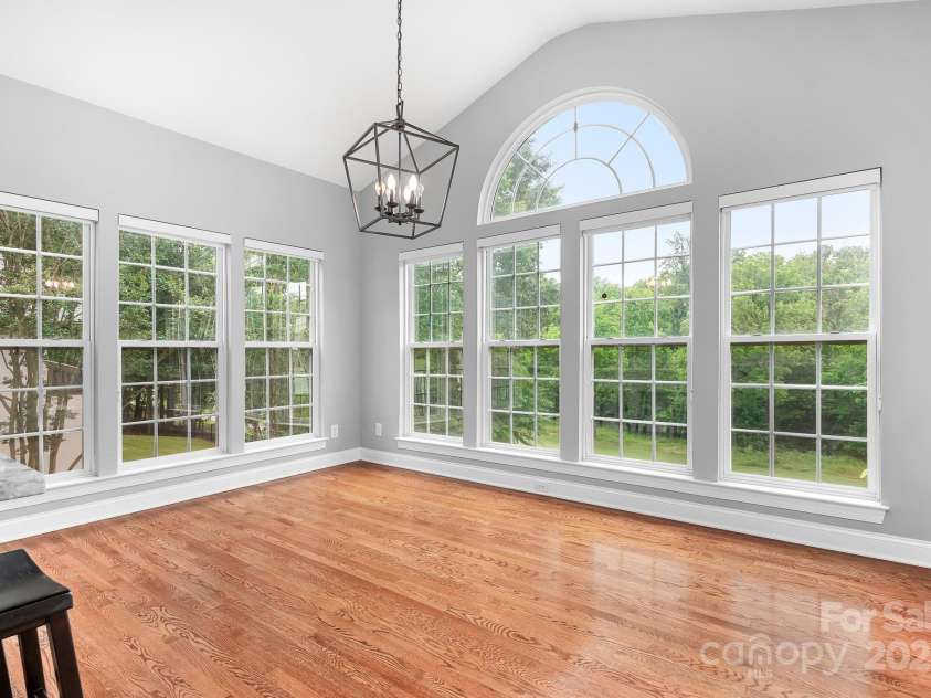 7191 Grist Mill Court, Denver, NC 28037.  MLS# CAR4221551, YatesRealty ID 26668. Dining area with natural light and wood floors