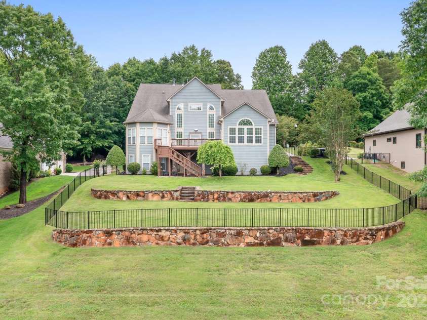 7191 Grist Mill Court, Denver, NC 28037.  MLS# CAR4221551, YatesRealty ID 26668. Double rock walls