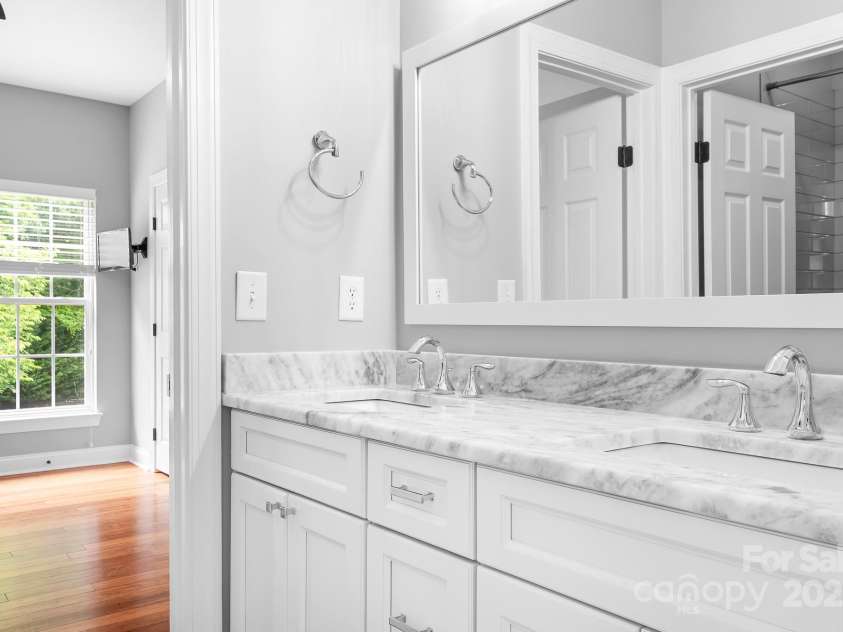 7191 Grist Mill Court, Denver, NC 28037.  MLS# CAR4221551, YatesRealty ID 26668. Jack and Jill Bathroom tile shower