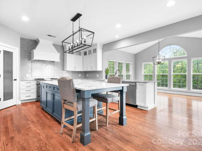 7191 Grist Mill Court, Denver, NC 28037.  MLS# CAR4221551, YatesRealty ID 26668. Renovated kitchen with quartzite counter tops