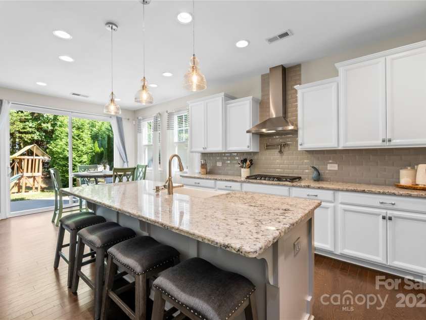 183 Rustling Waters Drive, Mooresville, NC 28117.  MLS# CAR4303069, YatesRealty ID 2667. 5 burner gas cooktop w/ pot filler and double wall oven