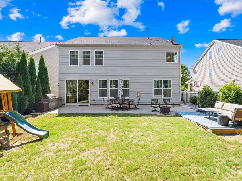 183 Rustling Waters Drive, Mooresville, NC 28117.  MLS# CAR4303069, YatesRealty ID 2667. Back of house