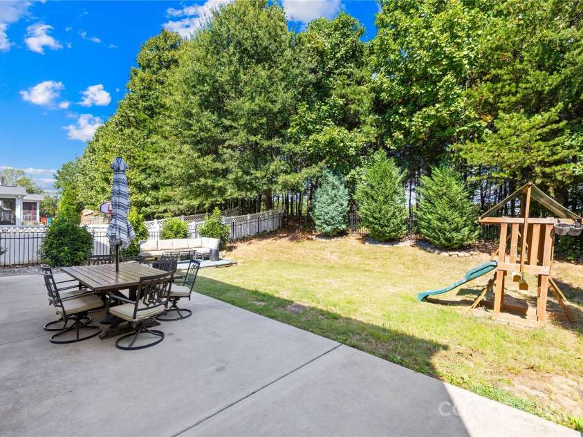 183 Rustling Waters Drive, Mooresville, NC 28117.  MLS# CAR4303069, YatesRealty ID 2667. Back patio