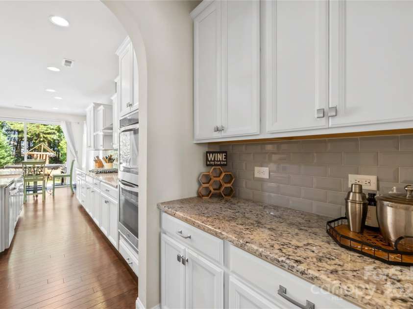 183 Rustling Waters Drive, Mooresville, NC 28117.  MLS# CAR4303069, YatesRealty ID 2667. Butler's pantry across from huge walk in pantry!