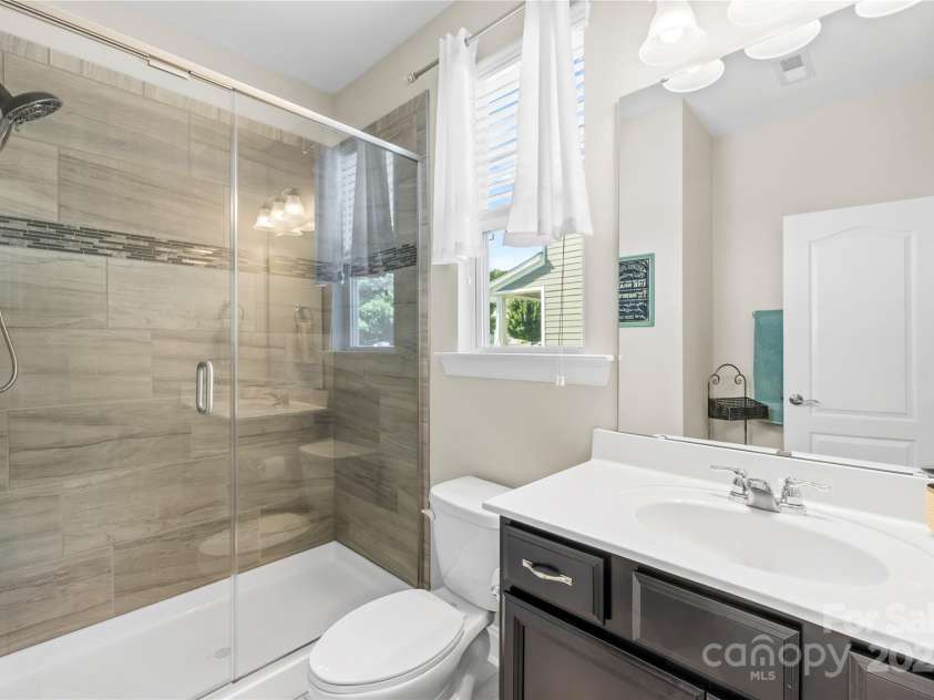 183 Rustling Waters Drive, Mooresville, NC 28117.  MLS# CAR4303069, YatesRealty ID 2667. Main floor full bathroom 