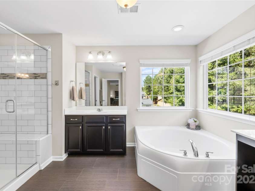 183 Rustling Waters Drive, Mooresville, NC 28117.  MLS# CAR4303069, YatesRealty ID 2667. Two vanities and oversized soaking tub