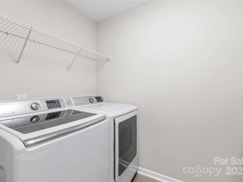 183 Rustling Waters Drive, Mooresville, NC 28117.  MLS# CAR4303069, YatesRealty ID 2667. Upper level laundry room