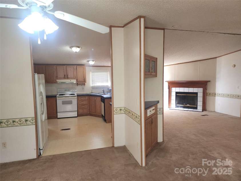 933 Osteen Road, York, SC 29745.  MLS# CAR4281275, YatesRealty ID 26671. Dining Kitchen, Great Room Angle
