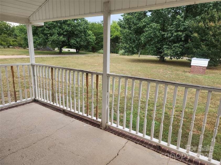 933 Osteen Road, York, SC 29745.  MLS# CAR4281275, YatesRealty ID 26671. Front Porch overlooks large front level lot
