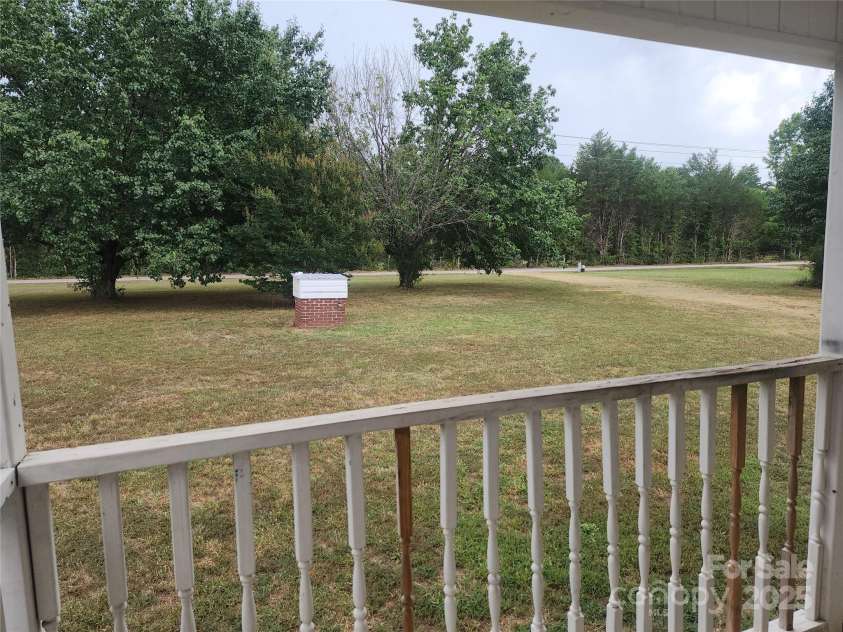 933 Osteen Road, York, SC 29745.  MLS# CAR4281275, YatesRealty ID 26671. Front porch view of driveway