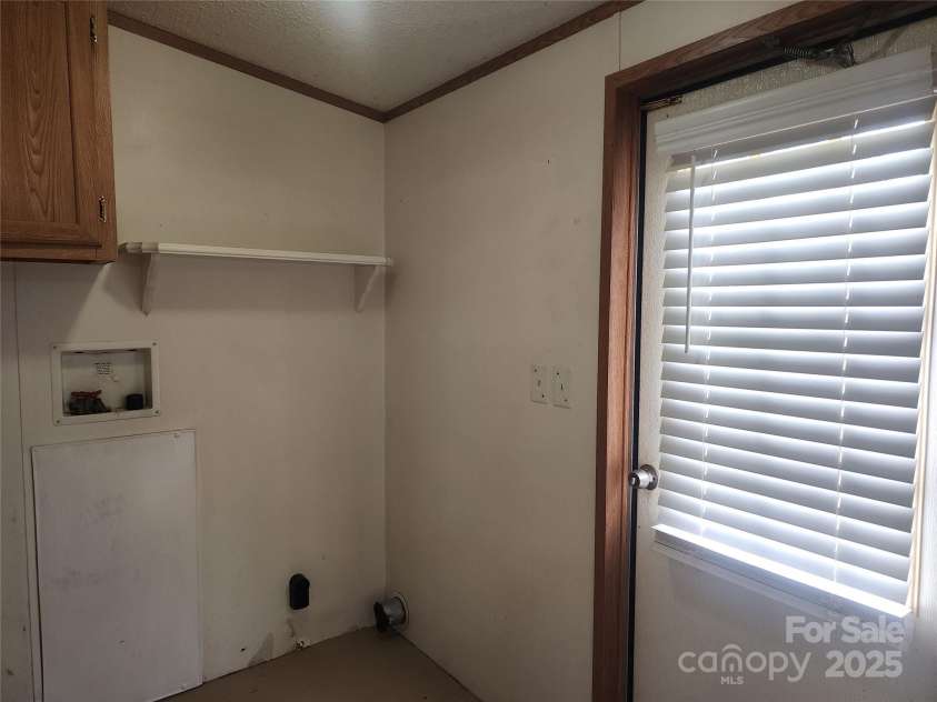 933 Osteen Road, York, SC 29745.  MLS# CAR4281275, YatesRealty ID 26671. Laundry Room at Rear Back door