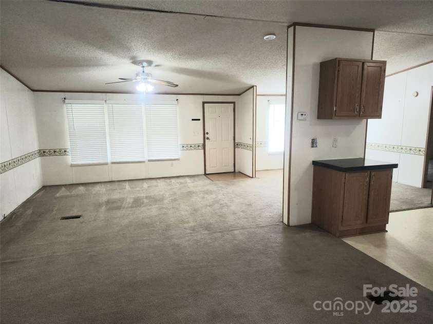 933 Osteen Road, York, SC 29745.  MLS# CAR4281275, YatesRealty ID 26671. View of Great Room from rear Patio Door