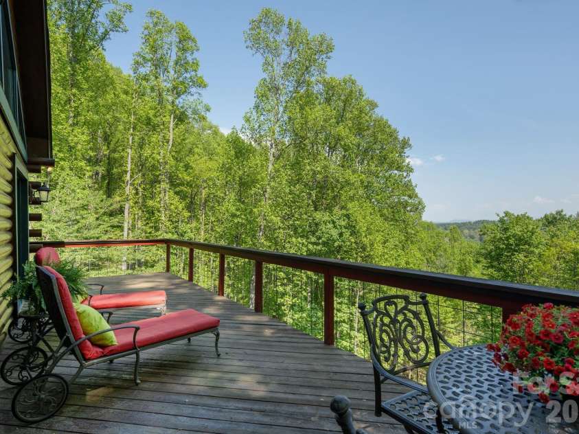 1126 Kilpatrick Road, Hendersonville, NC 28739.  MLS# CAR4384744, YatesRealty ID 26672. Back deck with lounge chairs