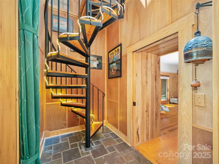 2490 US 80 Highway, Burnsville, NC 28714.  MLS# CAR4282852, YatesRealty ID 26673. Custom Spiral Staircase
