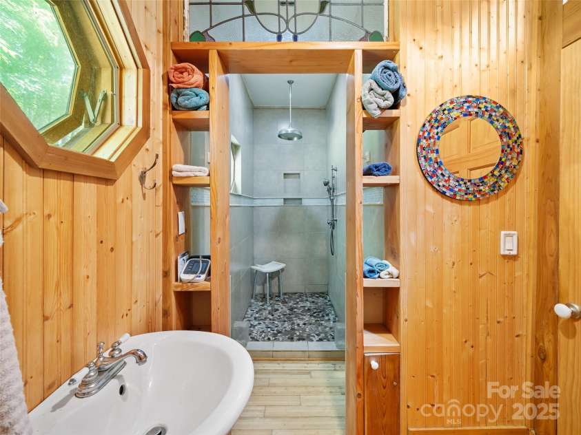 2490 US 80 Highway, Burnsville, NC 28714.  MLS# CAR4282852, YatesRealty ID 26673. Downstairs Full Bathroom