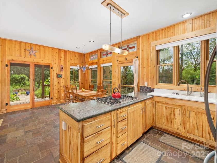 2490 US 80 Highway, Burnsville, NC 28714.  MLS# CAR4282852, YatesRealty ID 26673. Kitchen & Dining Area