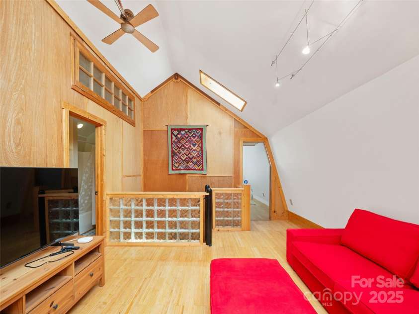 2490 US 80 Highway, Burnsville, NC 28714.  MLS# CAR4282852, YatesRealty ID 26673. Upstairs Family Room