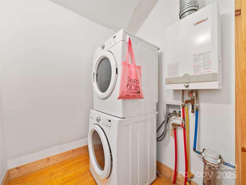 2490 US 80 Highway, Burnsville, NC 28714.  MLS# CAR4282852, YatesRealty ID 26673. Upstairs Laundry Room