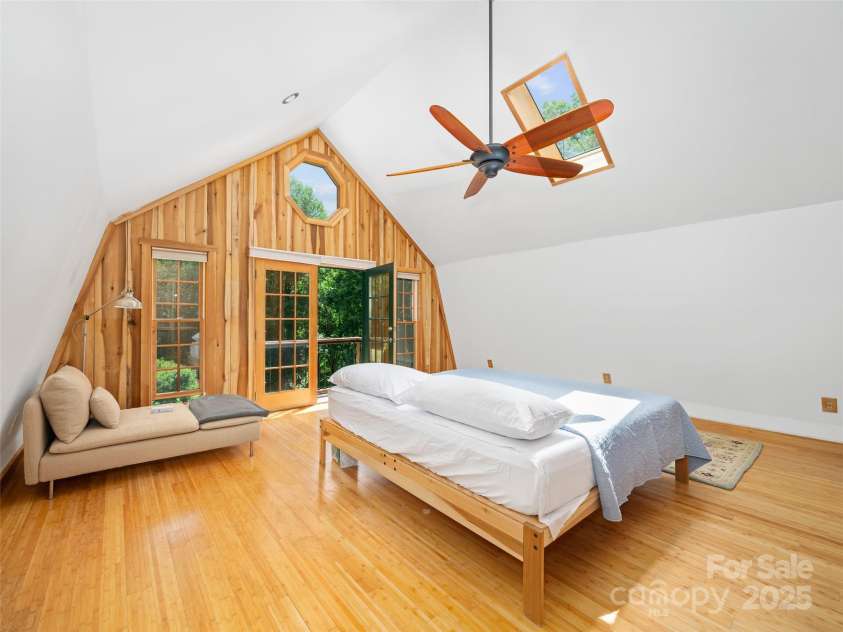 2490 US 80 Highway, Burnsville, NC 28714.  MLS# CAR4282852, YatesRealty ID 26673. Upstairs Primary Bedroom