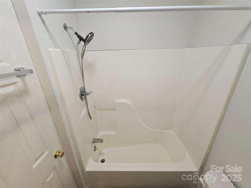 606 North Street, Belmont, NC 28012.  MLS# CAR4265350, YatesRealty ID 26675. Unit A full bathroom with low maintenance wood laminate floors