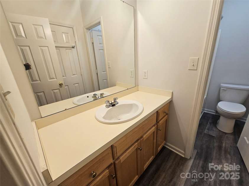 606 North Street, Belmont, NC 28012.  MLS# CAR4265350, YatesRealty ID 26675. Unit A -full bathroom with low maintenance wood laminate floors