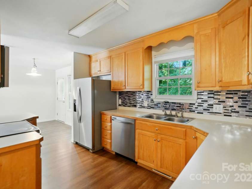 606 North Street, Belmont, NC 28012.  MLS# CAR4265350, YatesRealty ID 26675. Unit B Kitchen vinyl flooring