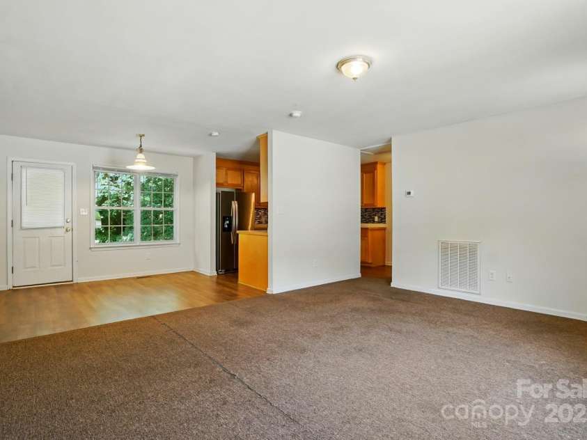 606 North Street, Belmont, NC 28012.  MLS# CAR4265350, YatesRealty ID 26675. Unit B living room and dining area view