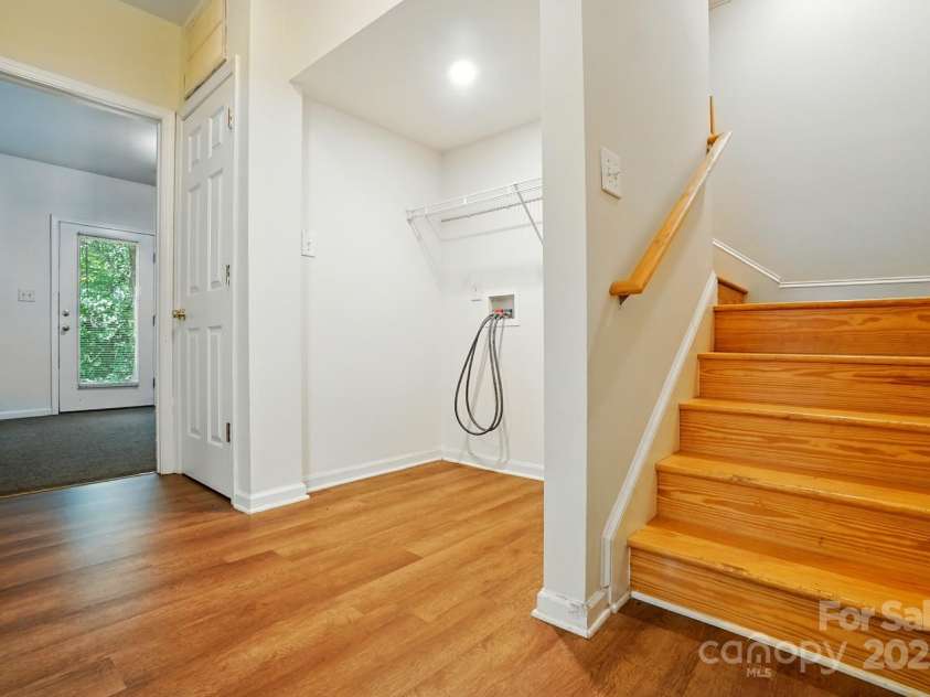 606 North Street, Belmont, NC 28012.  MLS# CAR4265350, YatesRealty ID 26675. Wood stairs, laundry and vinyl flooring