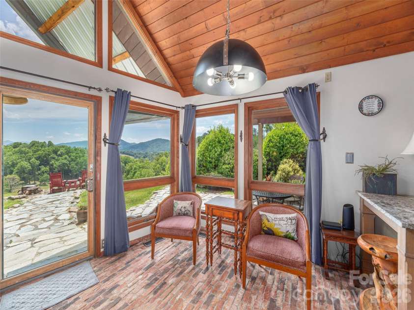 461 Ferguson Cove Loop, Clyde, NC 28721.  MLS# CAR4354575, YatesRealty ID 26678. Plenty of natural light throughout the home and yes, views, views, views!