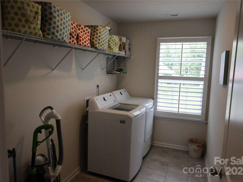 136 Dogwood Grove Place, Troutman, NC 28166.  MLS# CAR4276414, YatesRealty ID 26679. Laundry room