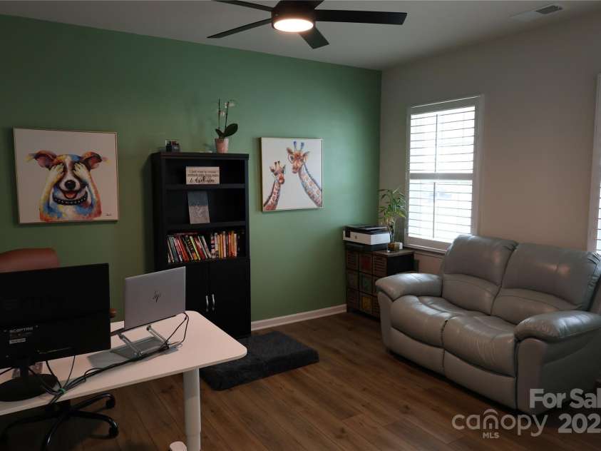 136 Dogwood Grove Place, Troutman, NC 28166.  MLS# CAR4276414, YatesRealty ID 26679. Lower level office/ dining room