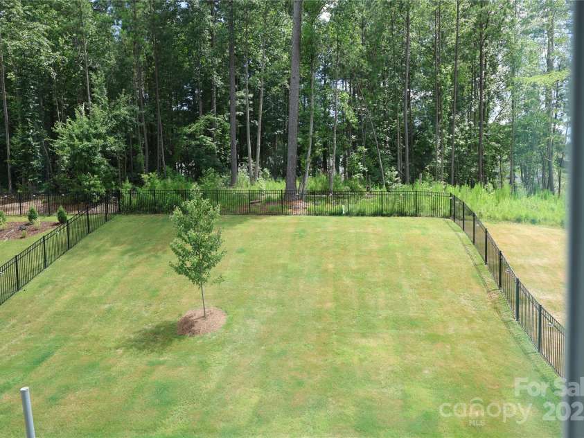 136 Dogwood Grove Place, Troutman, NC 28166.  MLS# CAR4276414, YatesRealty ID 26679. Private Rear fenced yard