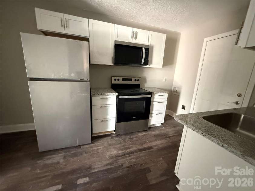 2427 Carmine Street, Charlotte, NC 28206.  MLS# CAR4339842, YatesRealty ID 2668. 2419