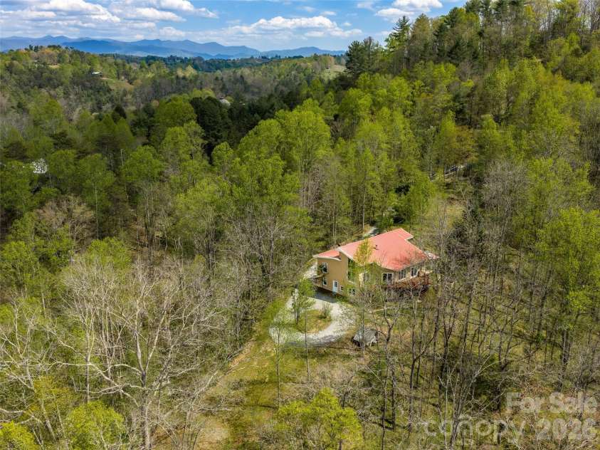 76 Raven Rock Lane, Marshall, NC 28753.  MLS# CAR4369847, YatesRealty ID 26680. Aerial shot