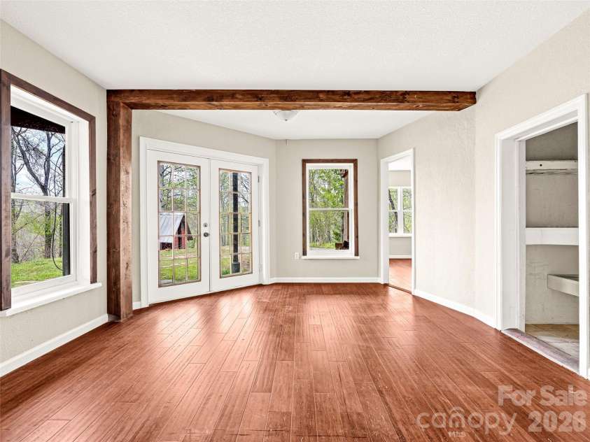 76 Raven Rock Lane, Marshall, NC 28753.  MLS# CAR4369847, YatesRealty ID 26680. Lower level game room