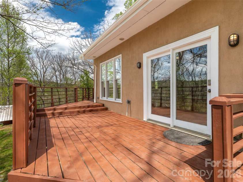 76 Raven Rock Lane, Marshall, NC 28753.  MLS# CAR4369847, YatesRealty ID 26680. Recently painted exterior and deck.