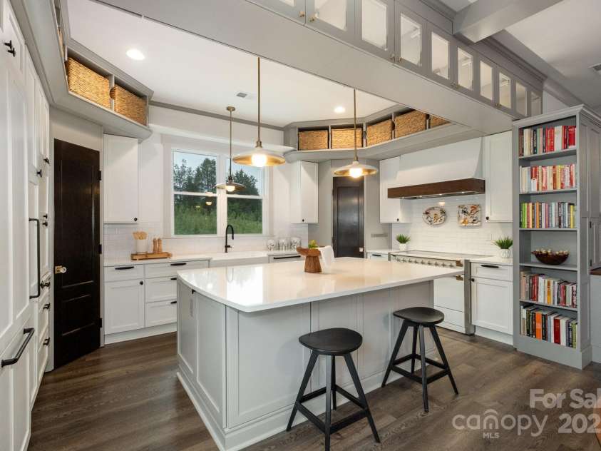 19031 Brandon James Drive, Cornelius, NC 28031.  MLS# CAR4256290, YatesRealty ID 26681. Gourmet appliances are perfect for the chef! Paneled Miele refrigerator and dishwasher and Aga range.
