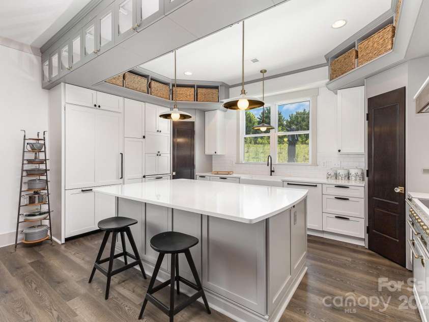 19031 Brandon James Drive, Cornelius, NC 28031.  MLS# CAR4256290, YatesRealty ID 26681. Pull up a stool in this gourmet space