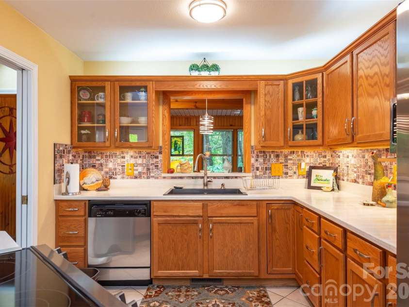 132 Rumbling Bald Road, Lake Lure, NC 28746.  MLS# CAR4385835, YatesRealty ID 26690. 