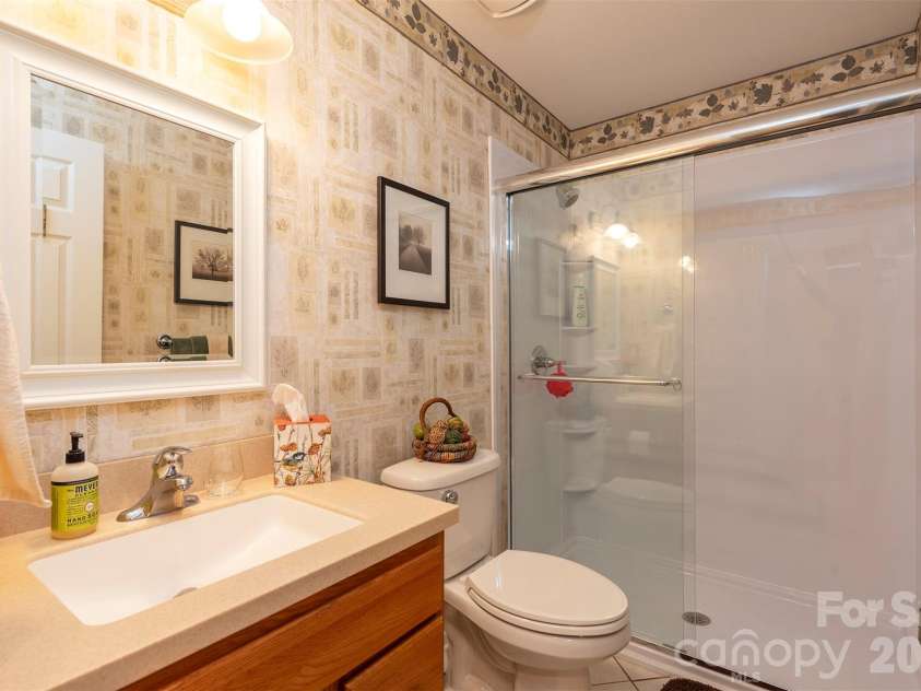 132 Rumbling Bald Road, Lake Lure, NC 28746.  MLS# CAR4385835, YatesRealty ID 26690. 